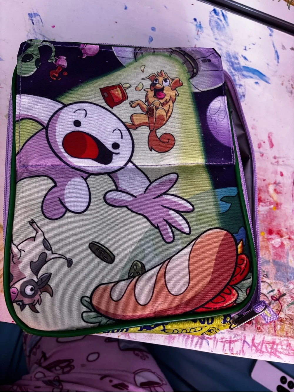 Odd1sout lunchbox with reversible front image